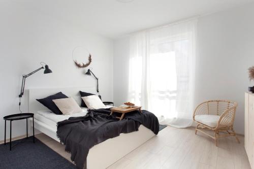 Posteľ alebo postele v izbe v ubytovaní NAP Apartments Długa Grobla