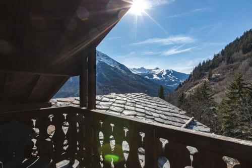 a balcony with a view of a mountain at L'arpont in Champagny-en-Vanoise