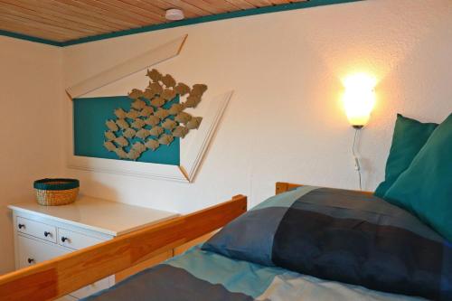 Krevet ili kreveti u jedinici u objektu Meerblick Apartment Bünning