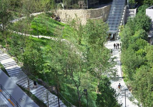 an overhead view of a park with trees and people walking at The Okura Tokyo in Tokyo
