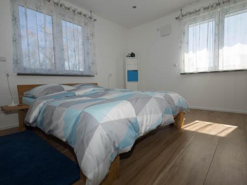 Postel nebo postele na pokoji v ubytování 16Lilien Apartmentwohnung Gartenblick