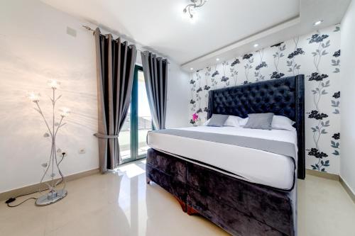 Katil atau katil-katil dalam bilik di Alt Braic Villa