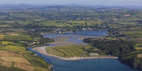 an aerial view of a river in the countryside at Celtic Ross Hotel & Leisure Centre in Rosscarbery