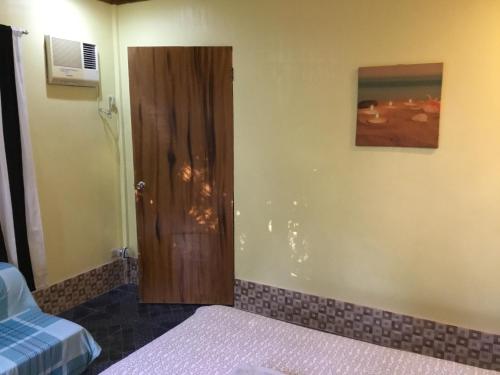 Postel nebo postele na pokoji v ubytování Sun & Sea Home Stay