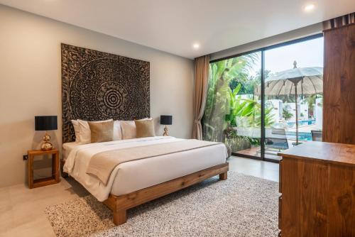 Katil atau katil-katil dalam bilik di Zee Luxury Boutique Hotel