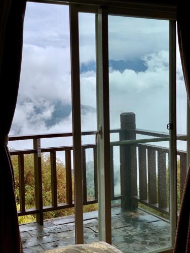 a view from the window of a room at The Cotswolds Villa in Renai