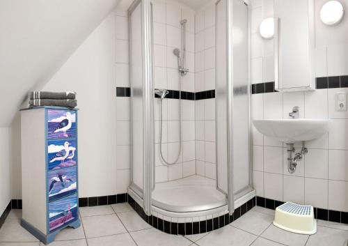 Ένα μπάνιο στο Haus Meerforelle Haus Meerforelle Wohnung 2