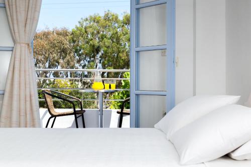 Кровать или кровати в номере Areti Hotel
