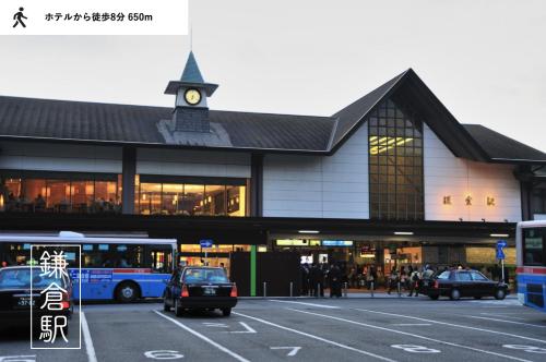 a building with a clock tower on top of it at GEN HOTEL KAMAKURA in Kamakura