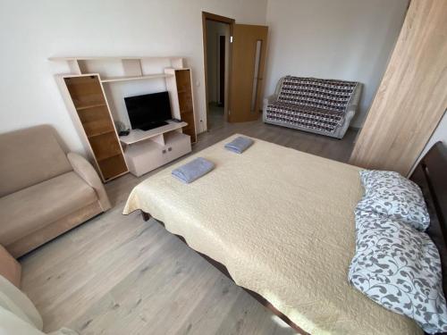 Кровать или кровати в номере Apartment in Kupchino