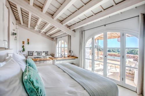 Postel nebo postele na pokoji v ubytování Torre Vella Fontenille Menorca