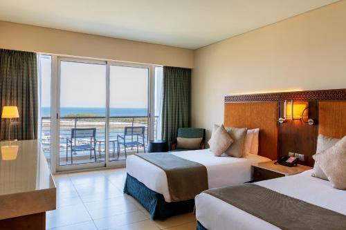 Postel nebo postele na pokoji v ubytování Barceló Mussanah Resort, Sultanate of Oman