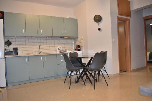 Dapur atau dapur kecil di Amazing Apartment