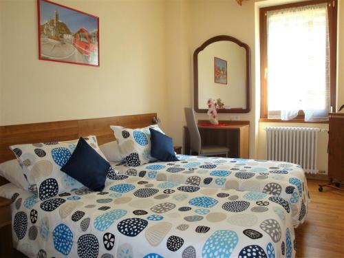 Una cama o camas en una habitación de Casa Lucini
