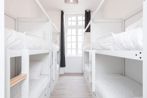 Postel nebo postele na pokoji v ubytování Le Couvent - Hostel