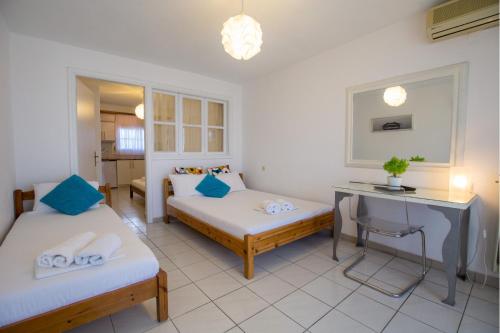Ένα ή περισσότερα κρεβάτια σε δωμάτιο στο D&D Holiday Studios