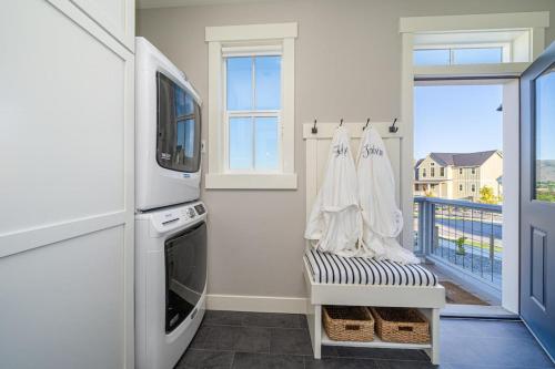 a kitchen with a view of a balcony at 5 O’Clock Somewhere #113 in Chelan