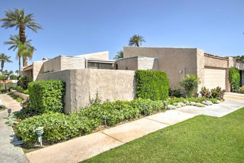 a house with a garden in front of it at Indian Wells Desert Paradise with Mtn View and Patio! in Indian Wells