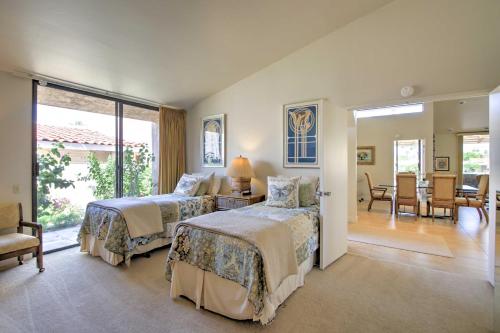 a bedroom with two beds and a living room at Indian Wells Desert Paradise with Mtn View and Patio! in Indian Wells