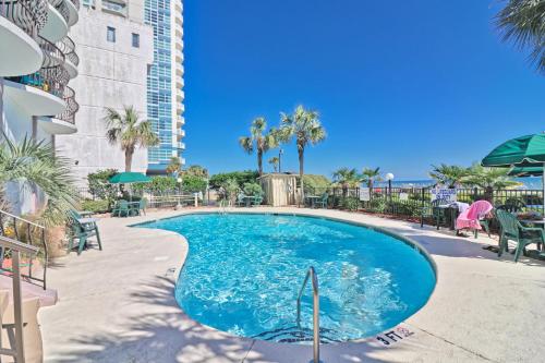 The swimming pool at or close to Suites at the Beach