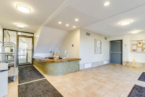 a large room with a counter in the middle at Suites at the Beach in Myrtle Beach