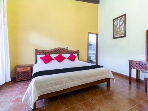 Katil atau katil-katil dalam bilik di Hotel Jardín de Tereza