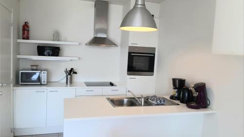 Kuchyň nebo kuchyňský kout v ubytování 19 Brussels Expo