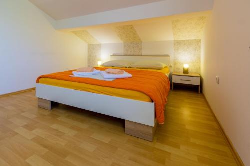 Posteľ alebo postele v izbe v ubytovaní Apartment LINDA