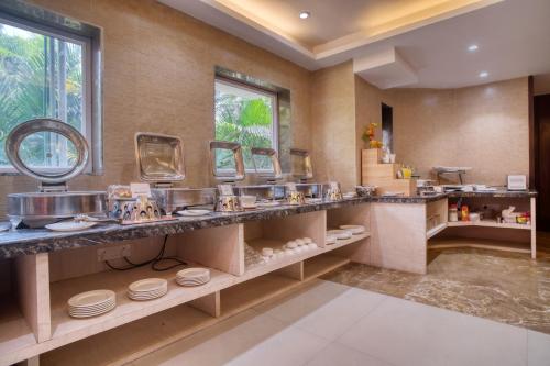 Kuchyň nebo kuchyňský kout v ubytování Roland Hotel