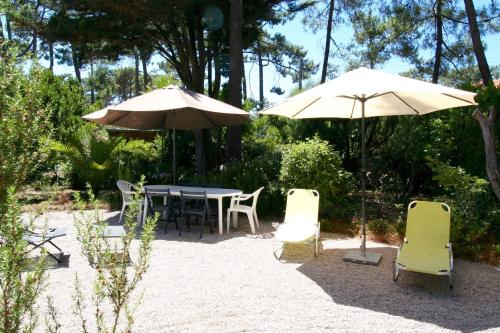 Photo de la galerie de l'établissement Lovely house with idyllic garden in very central Cap Ferret location, à Lège-Cap-Ferret