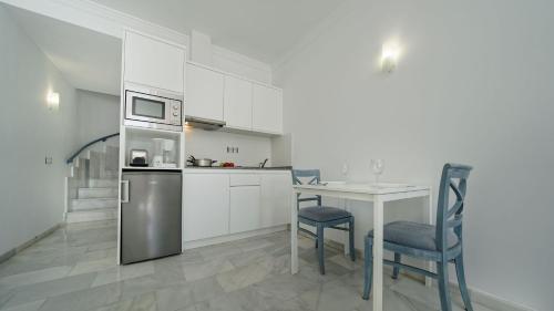 Dapur atau dapur kecil di Apartamentos Igramar MorroJable - Adults Only