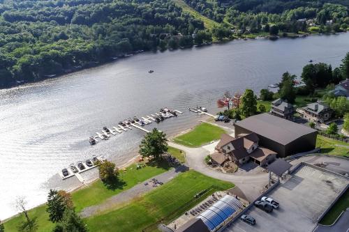 an aerial view of a marina on a river at Jeffrey Lane Condos in Thayerville