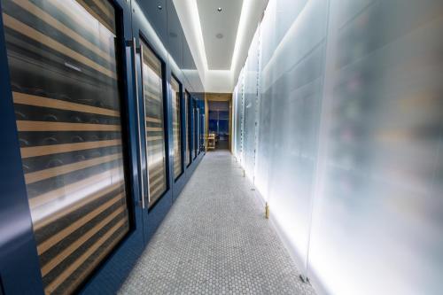 a corridor in a building with a hallway at InterContinental - Los Angeles Downtown by IHG in Los Angeles