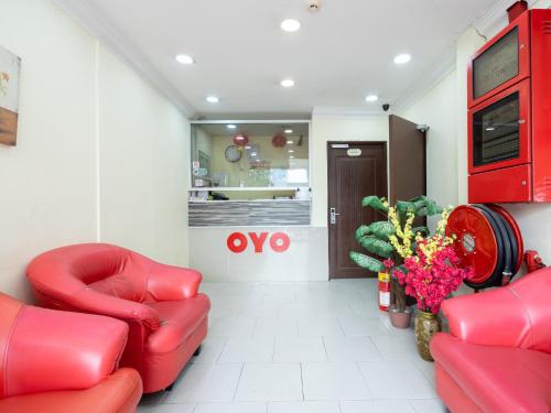 Area lobi atau resepsionis di OYO 89717 Budget Star Hotel