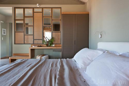 Diapori Suites Hotelにあるベッド