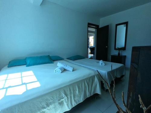 Postel nebo postele na pokoji v ubytování Apartamentos Sweet Island