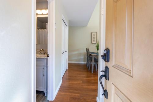 a hallway leading to a kitchen with a sink at @ Marbella Lane 6BR Duplex in Downtown San Jose in San Jose