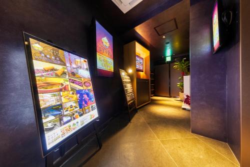 Televisyen dan/atau pusat hiburan di Hotel Lotus Koiwa (Adult Only)