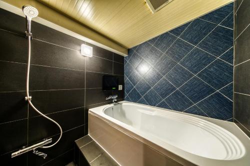 Bilik mandi di Hotel Lotus Koiwa (Adult Only)