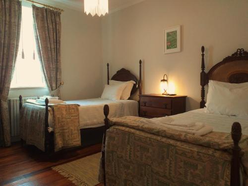 Giường trong phòng chung tại Quinta da Timpeira