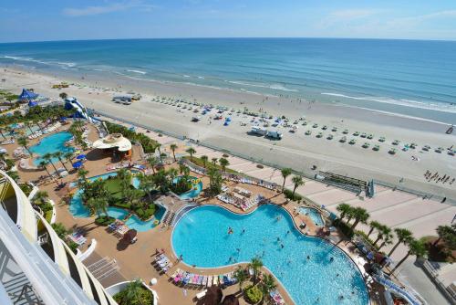 an aerial view of a resort with a beach at Wyndhams Ocean Walk Resort in Daytona Beach