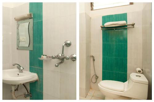 Ett badrum på Lumbini Guest House