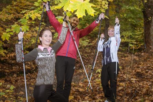 a man and two children on a trail with ski poles at Bristol Palace in Karlovy Vary