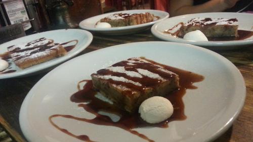 a table with plates of desserts on a table at Agriturismo Parco Campofelice in Lombardore