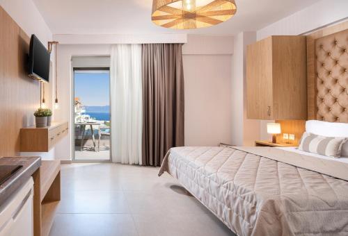 Postel nebo postele na pokoji v ubytování Sarti Premium Suites