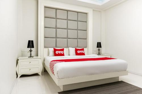 Llit o llits en una habitació de OYO 800 Orbit Key Hotel