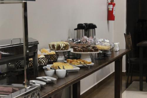 a buffet with many different types of food on a table at Sleep Hotel in Toledo