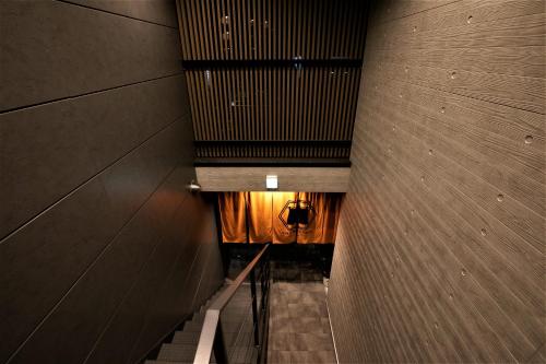 an overhead view of a hallway in a building at Apartment Hotel STAY THE Kansai Airport in Izumi-Sano
