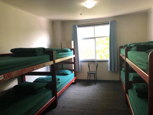 Postel nebo postele na pokoji v ubytování Elizabeth Hostel