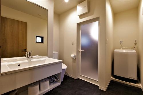 A bathroom at Apartment Hotel STAY THE Kansai Airport